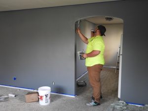 Painter, paint, house — Baby Before Beginning a house Improvement Project