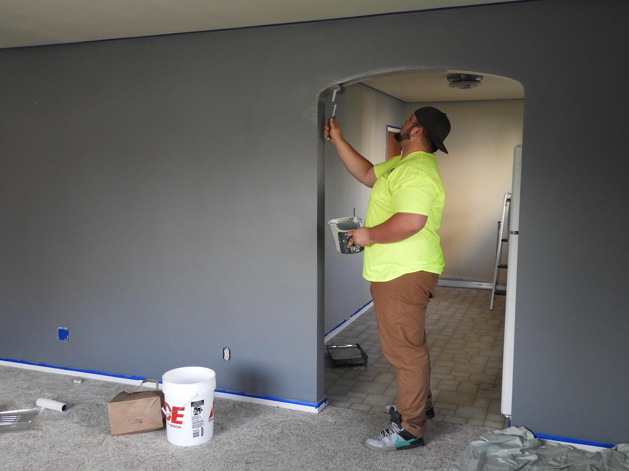 Painter, paint, house — Baby Before Beginning a house Improvement Project
