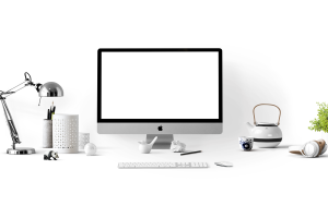 Apple, computer, desk — How to Sell Your Home for More Profit