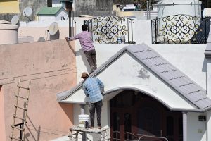 Painter, paint, house — Junk and Debris Removal Services